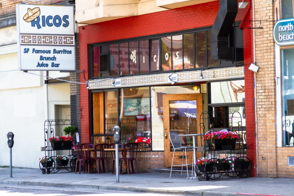 Rico's restaurant exterior in North Beach, San Francisco, with outdoor seating.